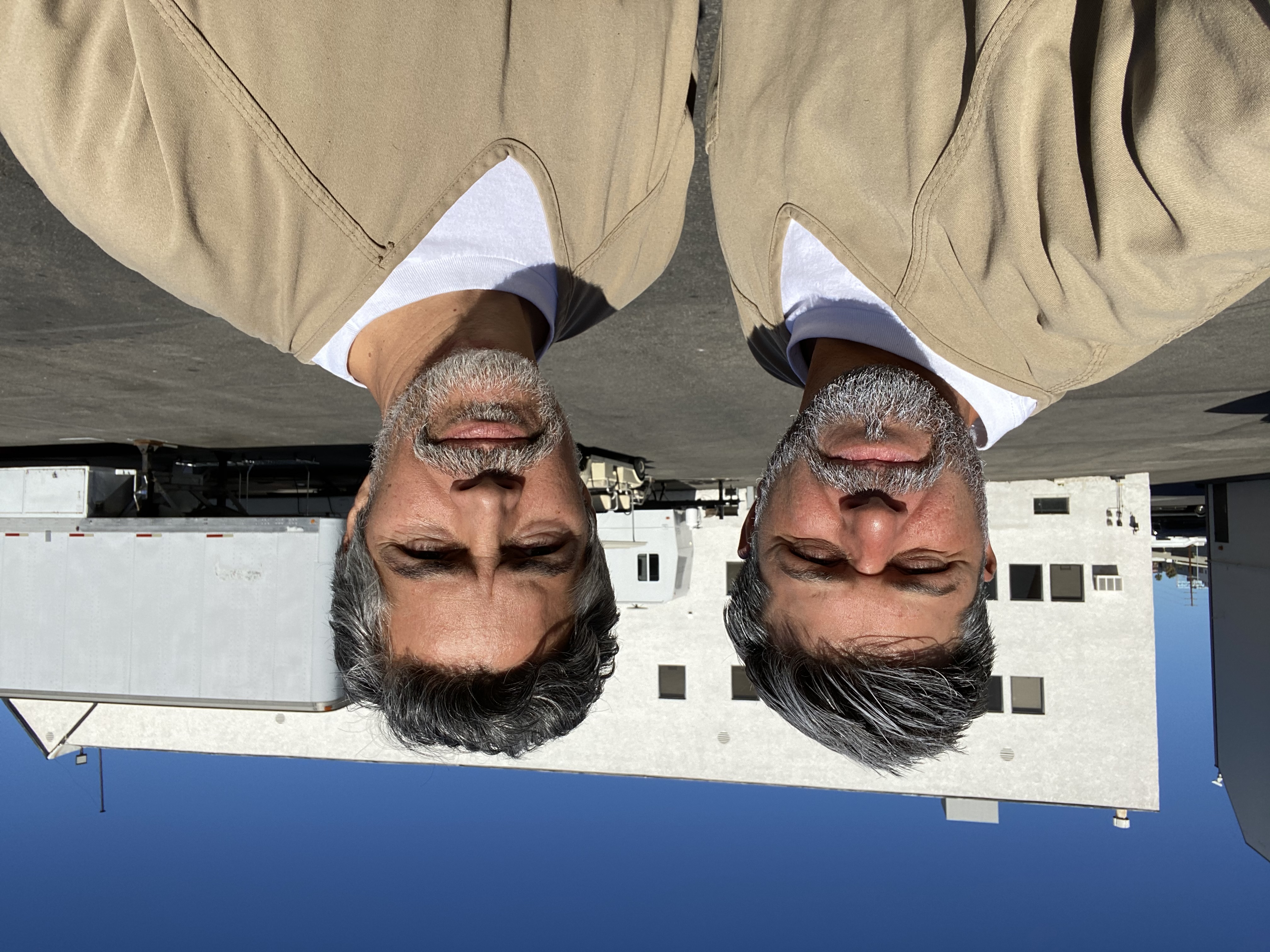 Sari Sabella with Esai Morales on set